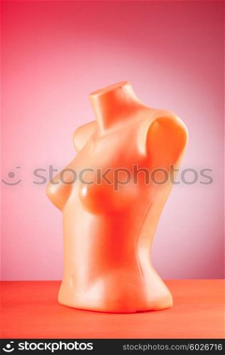 Clothing mannequins against gradient background