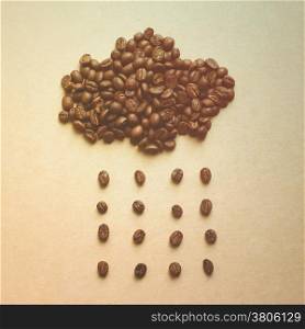 Cloud and rain from coffee beans with retro filter effect
