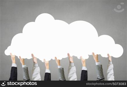 Cloud and teamwork concept. Many hands of business people holding cloud concept