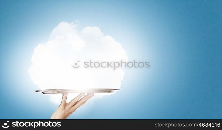 Cloud bubble. Human hand holding metal tray with cloud