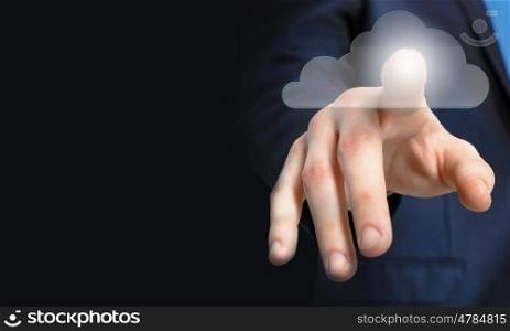 Cloud computing. Businessman pressing cloud icon on media screen