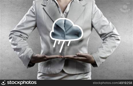 Cloud computing concept. Close up of businesswoman holding in hands cloud computing concept