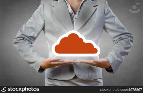 Cloud computing concept. Close up of businesswoman holding in hands cloud computing concept