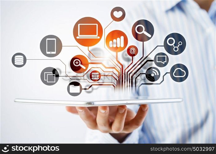 Cloud computing concept. Hand of businessman presenting tablet and cloud computing concept