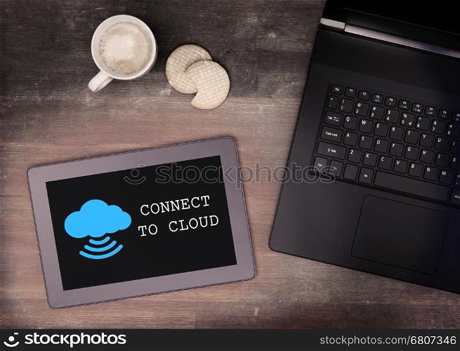Cloud-computing connection on a digital tablet pc, vintage setting