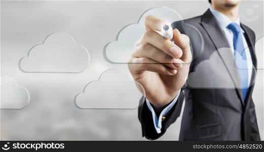 Cloud computing connectivity. Close up of businessman touching cloud icon on screen