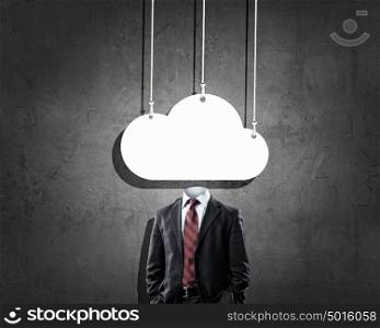 Cloud computing. Headless businessman with cloud instead of his head