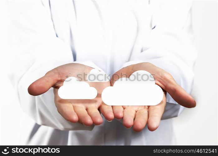 Cloud computing. Icon of cloud computing concept in human hands