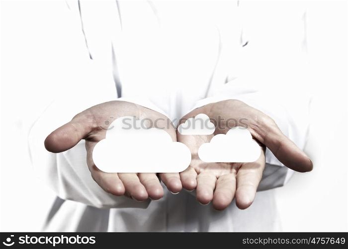 Cloud computing. Icon of cloud computing concept in human hands