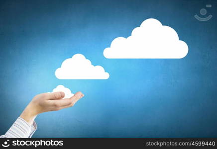 Cloud computing. Tablet pc in hands of businessman and cloud concept