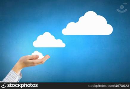 Cloud computing. Tablet pc in hands of businessman and cloud concept