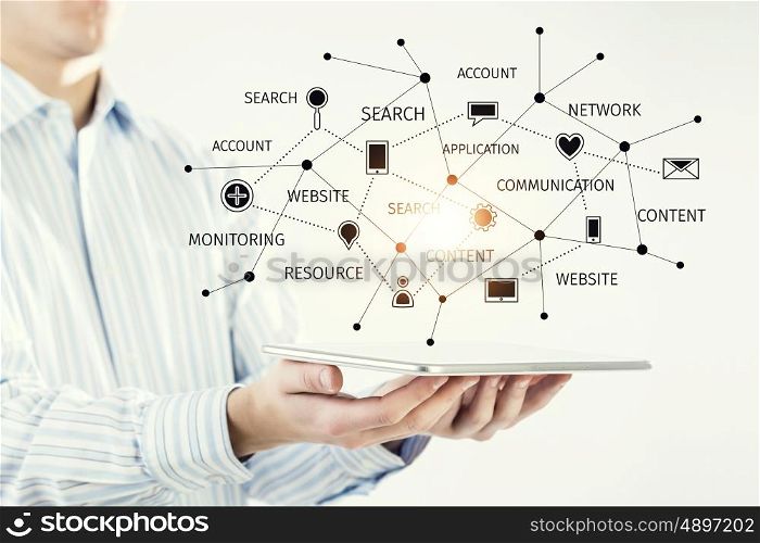 Cloud computing user interface. Tablet pc in hand and cloud connection media concept