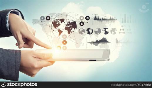 Cloud computing user interface. Tablet pc in hand and cloud connection media concept