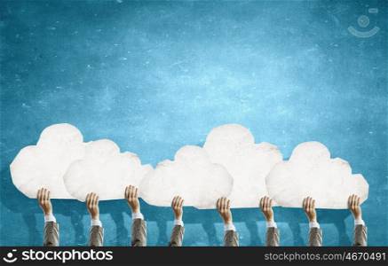 Cloud concept. Many hands of business people holding cloud concept
