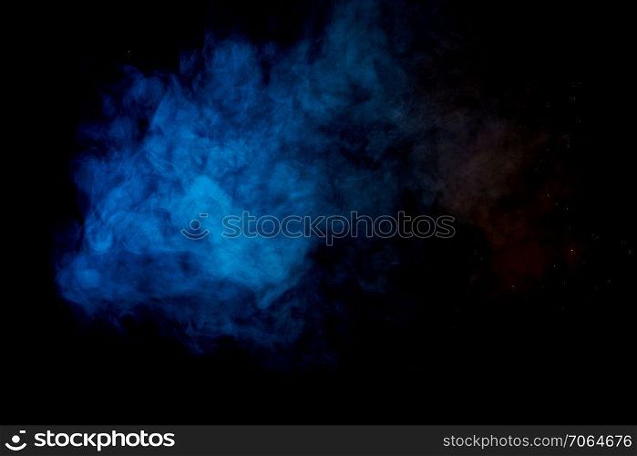 cloud of blue smoke on a black background. cloud of blue smoke