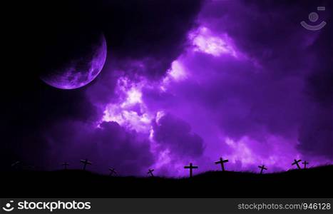 Cloud sky storm and moon on christian crosses. Purple tone.