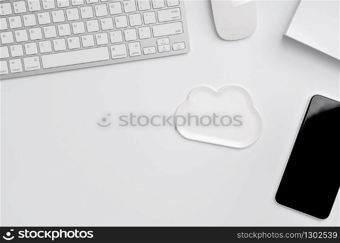 Cloud technology icon for global business concept from the top view on the workplace & desk