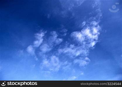Cloud Wisps In The Thin Blue Air