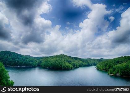 clouds and blue sky over summersville lake west virginia
