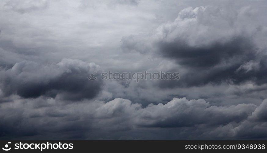 Clouds background, Rain clouds become dark gray like a big smoke before rainfall.