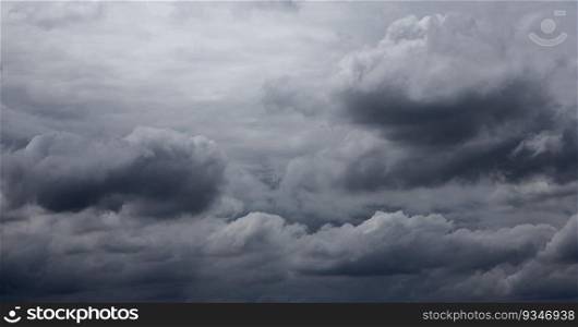 Clouds background, Rain clouds become dark gray like a big smoke before rainfall.