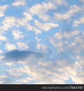 Clouds covered the sky in the morning. Scattered clouds covered the sky in the morning, with sunlight shines.