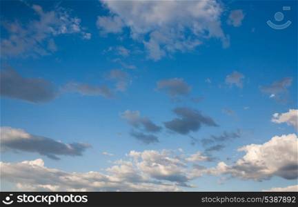 Clouds frame copyspace. Beautiful sparse clouds in the blue sky