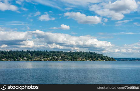 Clouds hover over Mercer Island, Washington. Shot taken from Seward Park.