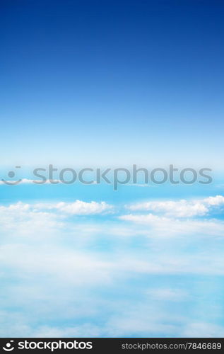 clouds in a blue sky, view from airplane