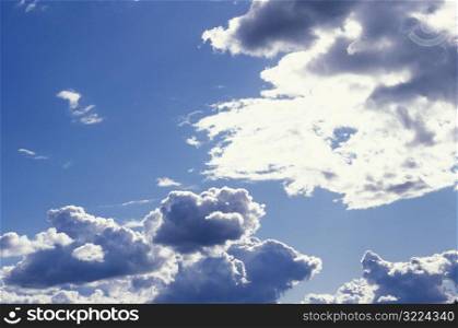 Clouds In A Sunny Blue Sky