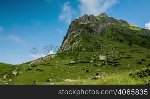 Clouds in blue sky and Kaukaz mountains 2 time lapse