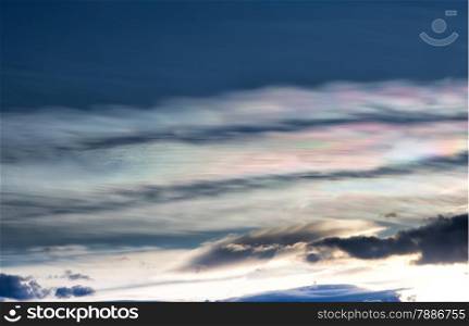 Clouds in pink and green at sunset