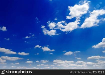 clouds on a background of the blue sky