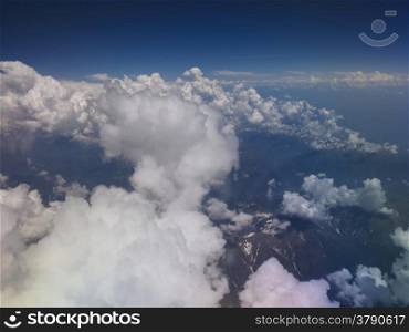 Clouds on Alps. Aerial view of clouds over Alps mountains