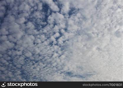 Clouds on the sky with details of background.