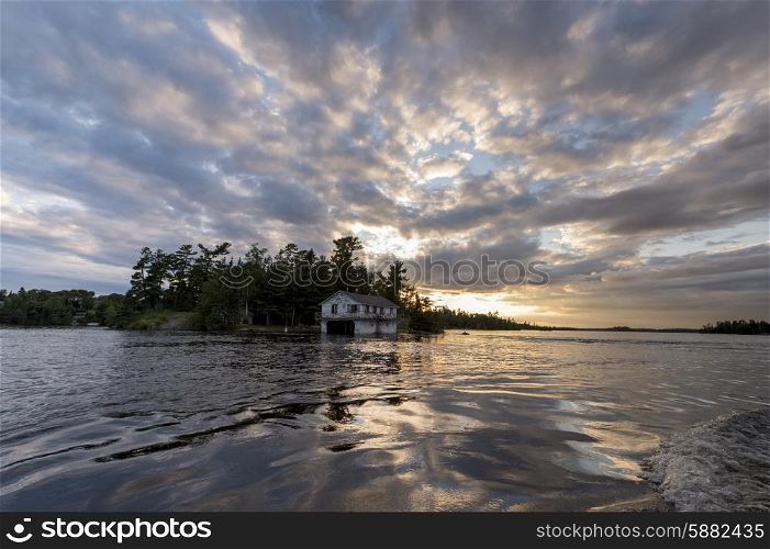 Clouds over a lake during sunset, Lake of the Woods, Ontario, Canada
