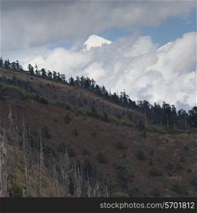Clouds over a mountain, Bhutan