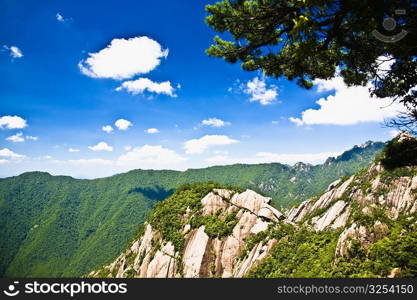 Clouds over a mountain range, Huangshan Mountains, Anhui Province, China