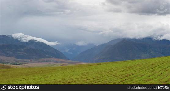 Clouds over an agricultural field, Sacred Valley, Cusco Region, Peru
