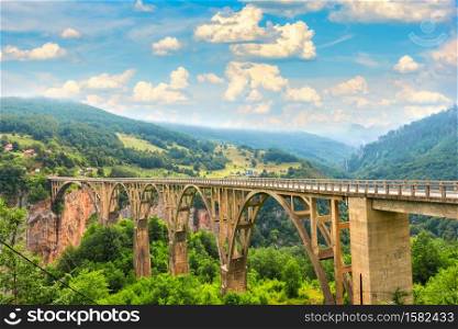 Clouds over Djurdjevica bridge in mountains of Montenegro