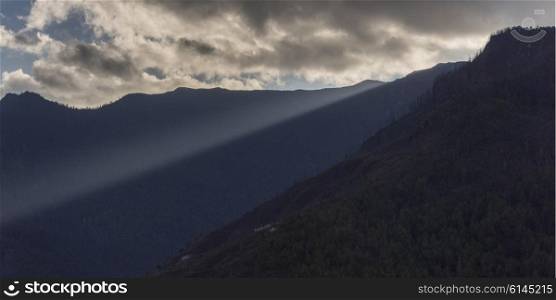 Clouds over mountain range, Paro, Paro District, Paro Valley, Bhutan