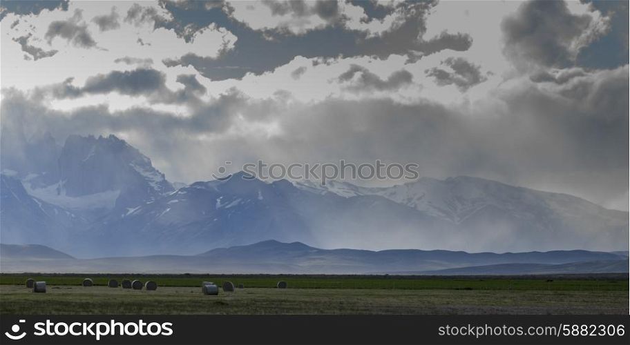 Clouds over mountain range, Torres Del Paine National Park, Patagonia, Chile