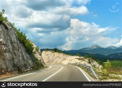 Clouds over road in high mountains of Montenegro. Clouds over road in mountains