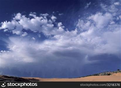 Clouds Over Sand Dunes