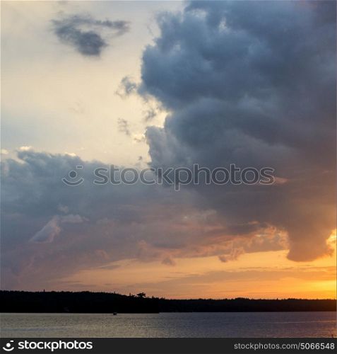Clouds over the lake at sunset, Lake of The Woods, Ontario, Canada