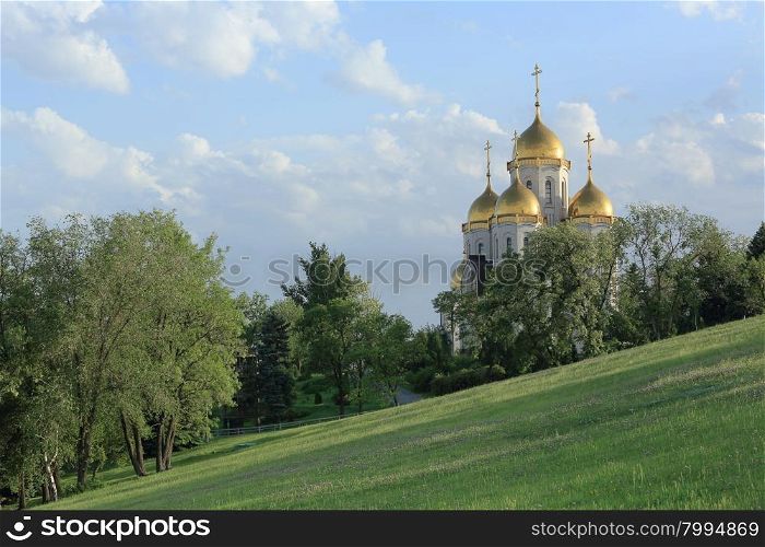 "Clouds over the orthodox temple of "All Saints Church" in Volgograd, Russia,"