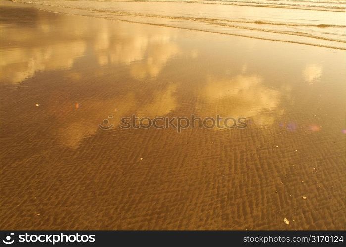 Clouds Reflected In Tidal Waters