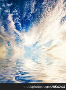 Clouds reflected in water