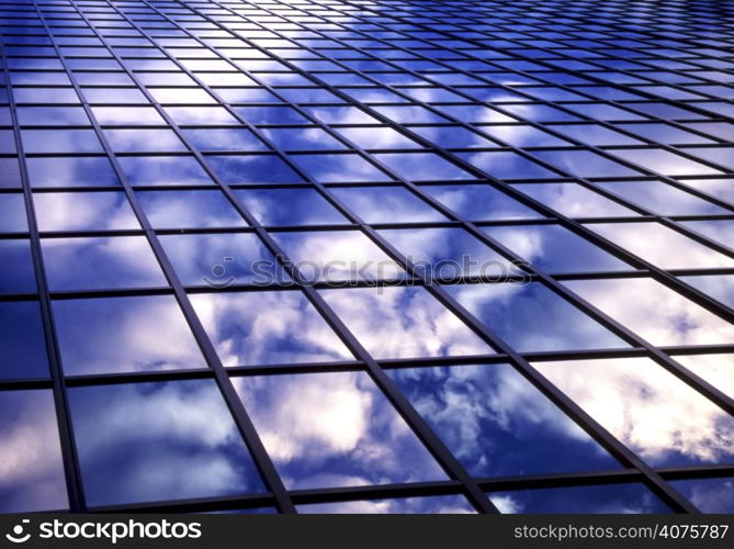 Clouds reflection on office windows