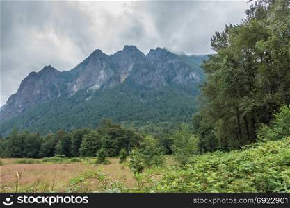 Clouds touch the top of Mount Si in Washington State.